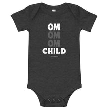 Load image into Gallery viewer, OM Child Baby Short Sleeve Onesie (Color Dark Grey Heather) - This super soft OM Child short sleeve one-piece for your tiny warrior features 100% combed and ring-spun cotton, and our classic "OM OM OM CHILD" front graphic printed with eco-friendly inks. The onesie design has has a three snap leg closure for easy changing at the bottom and a envelope neckline for ultimate comfort.