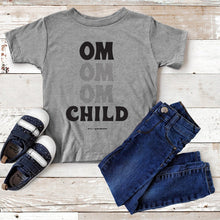 Load image into Gallery viewer, This tee is for the little yogi warriors in your life. This toddler short sleeve t-shirt features ultra-soft 100% combed and ring-spun cotton, our classic "OM OM OM CHILD" front graphic printed with eco-friendly inks, and a relaxed unisex fit for extra comfort.