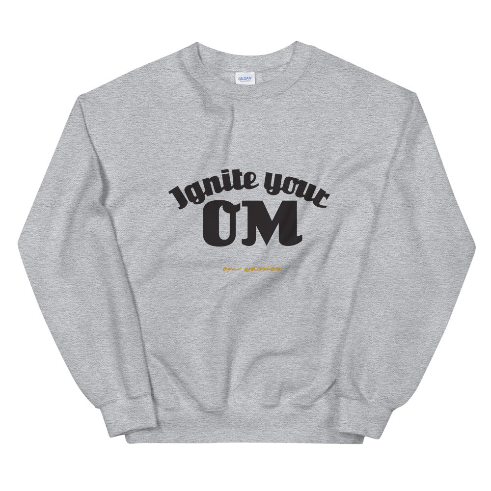 Ignite Your OM Unisex Sweatshirt (Color Heather Sport Grey) - Radiate good energy in our Ignite Your OM Classic Crew Sweatshirt, featuring a rib crewneck, raglan sleeves, and 'Ignite Your OM' front graphic printed with eco-friendly inks. Relaxed, slightly oversized fit. Made with 50% cotton and 50% polyester for ultimate coziness.