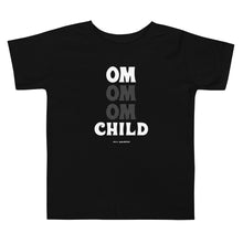 Load image into Gallery viewer, OM Child Toddler Short Sleeve Tee (Color Black) - This tee is for the little yogi warriors in your life. This toddler short sleeve t-shirt features ultra-soft 100% combed and ring-spun cotton, our classic &quot;OM OM OM CHILD&quot; front graphic printed with eco-friendly inks, and a relaxed unisex fit for extra comfort.

