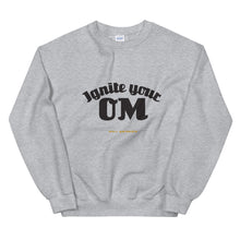 Load image into Gallery viewer, Ignite Your OM Unisex Sweatshirt (Color Heather Sport Grey) - Radiate good energy in our Ignite Your OM Classic Crew Sweatshirt, featuring a rib crewneck, raglan sleeves, and &#39;Ignite Your OM&#39; front graphic printed with eco-friendly inks. Relaxed, slightly oversized fit. Made with 50% cotton and 50% polyester for ultimate coziness.
